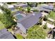 An aerial view showcases the home's pool, backyard, roof, and surrounding neighborhood at 503 Savona Ct, Altamonte Springs, FL 32701