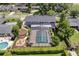 An aerial view showcases the backyard pool, fire pit, and landscaping at 503 Savona Ct, Altamonte Springs, FL 32701
