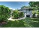 The large backyard features a screened-in pool, hot tub, and artificial turf at 503 Savona Ct, Altamonte Springs, FL 32701