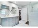 Bathroom with double vanity, white countertops, and glass shower at 503 Savona Ct, Altamonte Springs, FL 32701