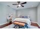 Bedroom featuring hardwood floors, ceiling fan, vanity, and bench at 503 Savona Ct, Altamonte Springs, FL 32701