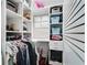 Walk-in closet with custom shelves, drawers, and ample hanging space at 503 Savona Ct, Altamonte Springs, FL 32701