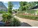 Professionally landscaped backyard features decorative mulch beds and lush greenery at 503 Savona Ct, Altamonte Springs, FL 32701