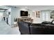 Inviting living room with tile flooring, recessed lights, and open access to the kitchen at 503 Savona Ct, Altamonte Springs, FL 32701