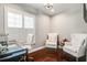 Bright office space with hardwood floors, plantation shutters, and comfortable seating at 503 Savona Ct, Altamonte Springs, FL 32701