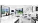 Bright, open living space with modern decor and a view of the outdoors at 7811 Waterscape Dr, Groveland, FL 34736