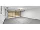 Spacious and clean garage, featuring a fully functional door and ample storage space for vehicles and belongings at 8111 Lianna Dr, Orlando, FL 32822