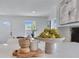 Bright kitchen featuring white countertops, light-filled ambiance, and stylish decorative elements at 8111 Lianna Dr, Orlando, FL 32822