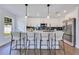 Beautiful kitchen features stainless steel appliances, a modern backsplash, and pendant lighting at 8111 Lianna Dr, Orlando, FL 32822