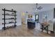 Inviting living room includes modern shelving, hardwood floors, and neutral decor at 8111 Lianna Dr, Orlando, FL 32822