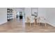 Bright living room featuring wood floors and modern decor with two stylish chairs at 8111 Lianna Dr, Orlando, FL 32822