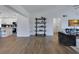 Bright, open-concept living room showcases hardwood floors and a seamless layout at 8111 Lianna Dr, Orlando, FL 32822