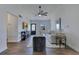 Open living room boasts stylish furniture, a ceiling fan, and lots of natural light at 8111 Lianna Dr, Orlando, FL 32822