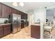 Well-equipped kitchen with stainless steel appliances and ample counter space at 8162 Prestbury Dr, Orlando, FL 32832