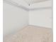 Walk-in closet features carpeted floors and wire shelving at 8955 Fluffy Lie Ct, Davenport, FL 33896