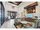 A welcoming clubhouse lounge with cozy seating, entertainment, and stylish decor for relaxation and community gatherings at 8955 Fluffy Lie Ct, Davenport, FL 33896