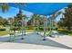 Outdoor fitness area with exercise equipment and shade at 8955 Fluffy Lie Ct, Davenport, FL 33896