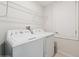 Bright laundry room with modern washer and dryer at 8955 Fluffy Lie Ct, Davenport, FL 33896