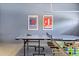 Multi-purpose garage with ping pong table, foosball, decor, and epoxy floor at 9023 Shadow Mountain St, Davenport, FL 33896