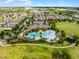 Enjoy this community's luxurious swimming pool, lounge seating, and tropical landscaping at 9128 Sonoma Coast Dr, Winter Garden, FL 34787