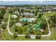 Aerial view of the community pool area, with a putting green, and plenty of lounge space at 9128 Sonoma Coast Dr, Winter Garden, FL 34787