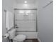 Bathroom with white subway tile in the shower, toilet, and a single sink vanity at 9128 Sonoma Coast Dr, Winter Garden, FL 34787