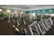 Modern gym equipped with state-of-the-art treadmills, weights and exercise machines for a comprehensive workout at 9128 Sonoma Coast Dr, Winter Garden, FL 34787