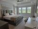 Bright and spacious main bedroom suite with tray ceilings and large windows with a view at 9128 Sonoma Coast Dr, Winter Garden, FL 34787