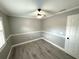 Bedroom with hard surface floors, natural light, and neutral paint at 926 Freshmeadow Ct, Apopka, FL 32703
