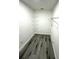 Walk-in closet with built in shelving and hard surface floors at 926 Freshmeadow Ct, Apopka, FL 32703