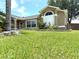 Beautiful single-Gathering home with manicured lawn and lush landscaping in a peaceful setting at 926 Freshmeadow Ct, Apopka, FL 32703