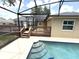 Relax and enjoy the pool and wooden deck in the backyard at 926 Freshmeadow Ct, Apopka, FL 32703