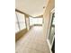 Enclosed sunroom with sliding glass doors and natural light at 926 Freshmeadow Ct, Apopka, FL 32703