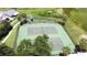 Aerial view of tennis courts, playground, and surrounding greenery at 926 Freshmeadow Ct, Apopka, FL 32703