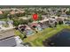 Residential neighborhood featuring many homes with private screened-in pools and solar panels at 1111 Liberty Hall Dr, Kissimmee, FL 34746