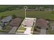 An aerial view shows a single-Gathering home with a fenced yard and green space at 1166 Mapimi Ct, Winter Springs, FL 32708