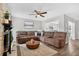 Comfortable living room with a sectional sofa, accent pillows, and a cozy atmosphere at 1166 Mapimi Ct, Winter Springs, FL 32708