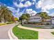 A welcome sign greets residents to the neighborhood of Lost Creek, with well-maintained landscaping at 1173 Valley Creek Run, Winter Park, FL 32792