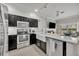 Updated kitchen features stainless steel appliances, marble countertops, and lots of space at 1191 Honey Blossom Dr # D, Orlando, FL 32824