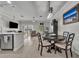 Open-concept living area featuring tile floors, neutral paint, and modern furnishings at 1191 Honey Blossom Dr # D, Orlando, FL 32824