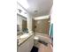 Bathroom with a shower over tub, granite countertops, and a tiled floor at 12207 Florida Woods Ln, Orlando, FL 32824
