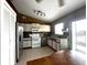 Functional kitchen with stainless appliances, granite countertops, and tile flooring at 12207 Florida Woods Ln, Orlando, FL 32824