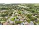 Neighborhood aerial view showcasing the community and surrounding trees at 14157 Louisville Ct, Orlando, FL 32826