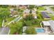 Aerial view of the fenced backyard with a shed, and pool area at 14157 Louisville Ct, Orlando, FL 32826