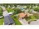Aerial view of a home with fenced backyard, pool, and patio at 14157 Louisville Ct, Orlando, FL 32826