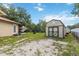 View of backyard with shed and play set at 14157 Louisville Ct, Orlando, FL 32826