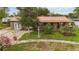 Charming home featuring a unique stone accent wall and inviting front porch seating at 14157 Louisville Ct, Orlando, FL 32826