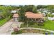 Charming home featuring a unique stone accent wall and inviting front porch seating at 14157 Louisville Ct, Orlando, FL 32826