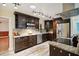 Stylish kitchen with stainless steel appliances and stone countertops at 14157 Louisville Ct, Orlando, FL 32826