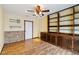 Spacious living room features built-in shelving and unique stone accents at 14157 Louisville Ct, Orlando, FL 32826